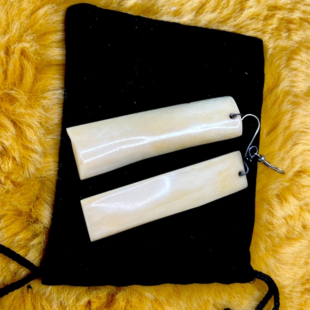 Bone coloured earrings